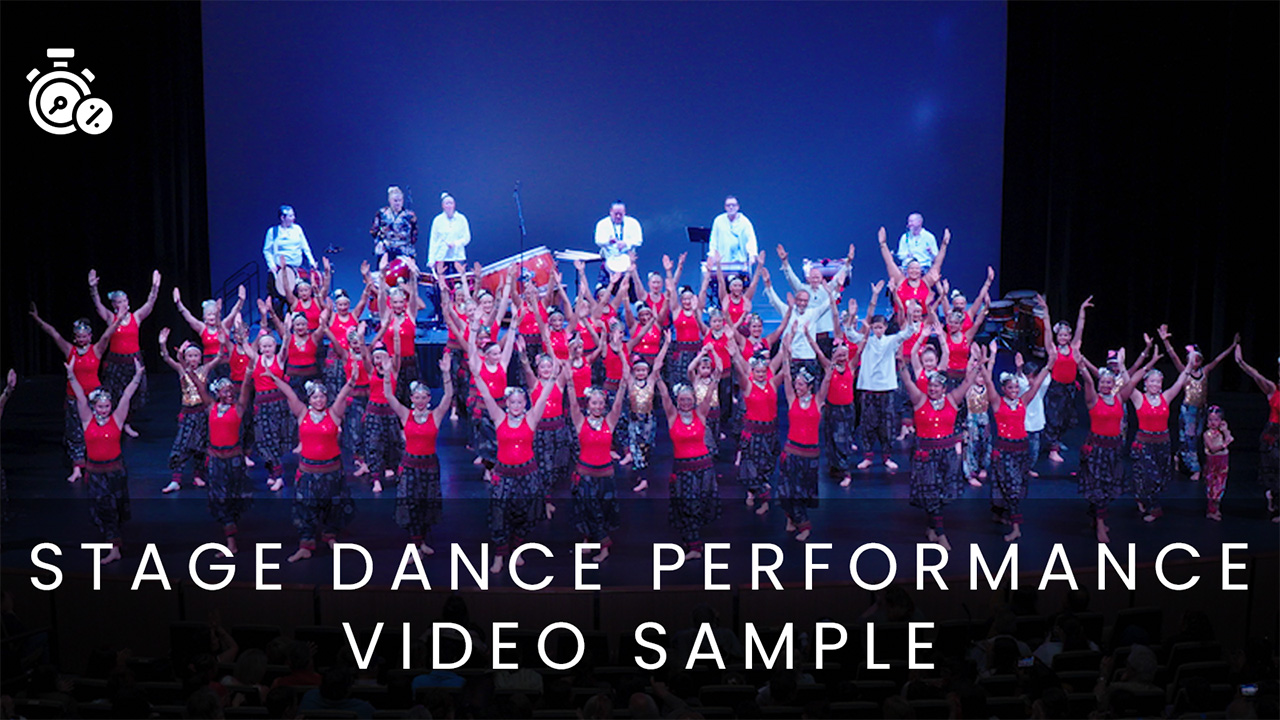 Wide angle shot of a creative dance performance on stage in Denver by Jay Billups Creative Media