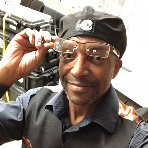 Jay Billups packing up after a long day of shooting video for a client in Denver